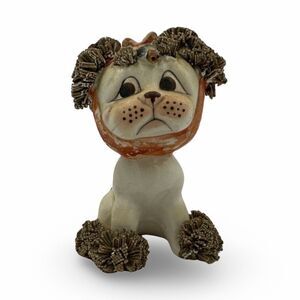 Spaghetti Dog Figurine with a toothache by Lefton